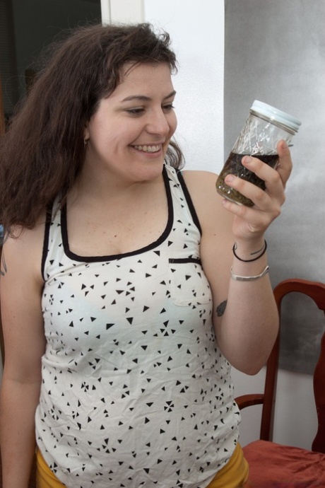 Nasty amateur bitch Esther exposing her juicy breasts and fluffy pussy
